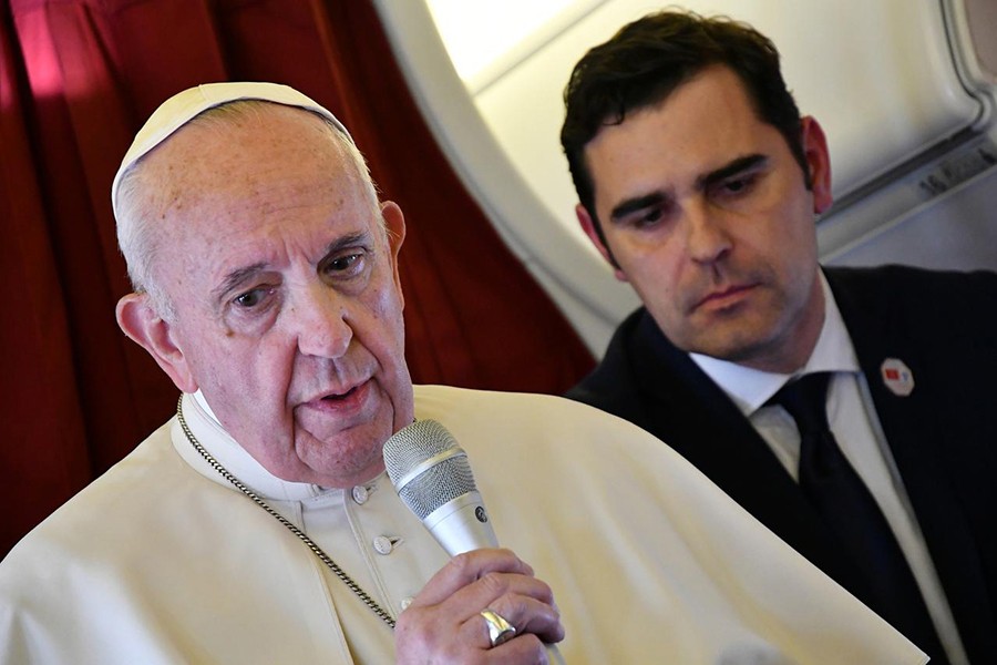 Pope Francis addresses reporters aboard the plane bringing him back following a two-day trip to Morocco March 31, 2019 — Reuters photo