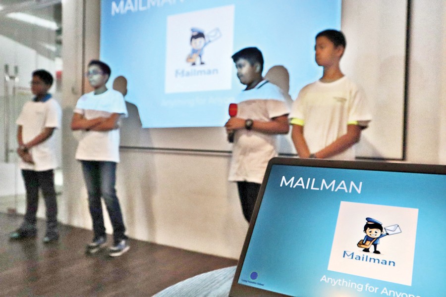 Young students presenting a startup idea -- a business that can bring customers and sellers in one platform so that they can buy all kinds of goods from all kinds of vendors