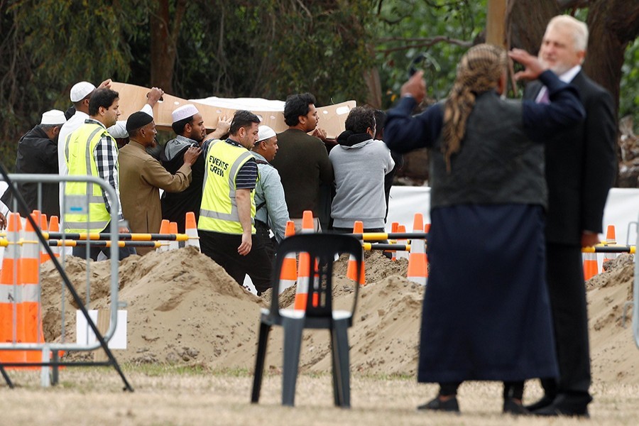 People attend the burial ceremony of Hussein Mohamed Khalil Moustafa, 70, a victim of the mosque attacks, at the Memorial Park Cemetery in Christchurch, New Zealand on March 21, 2019 — Reuters photo