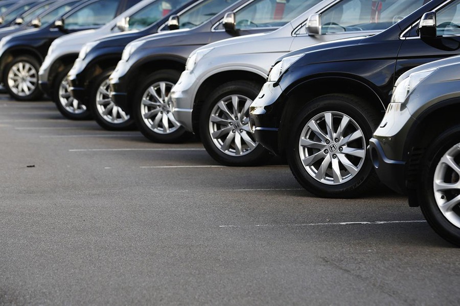 Cars are displayed outside a showroom in west London October 4, 2013 — Reuters/Files