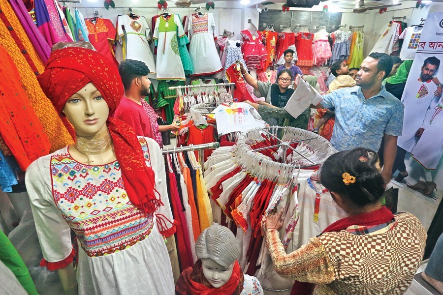 A fashion store at a shopping mall in the city giving a busy look on Friday ahead of Pahela Baishakh — FE photo