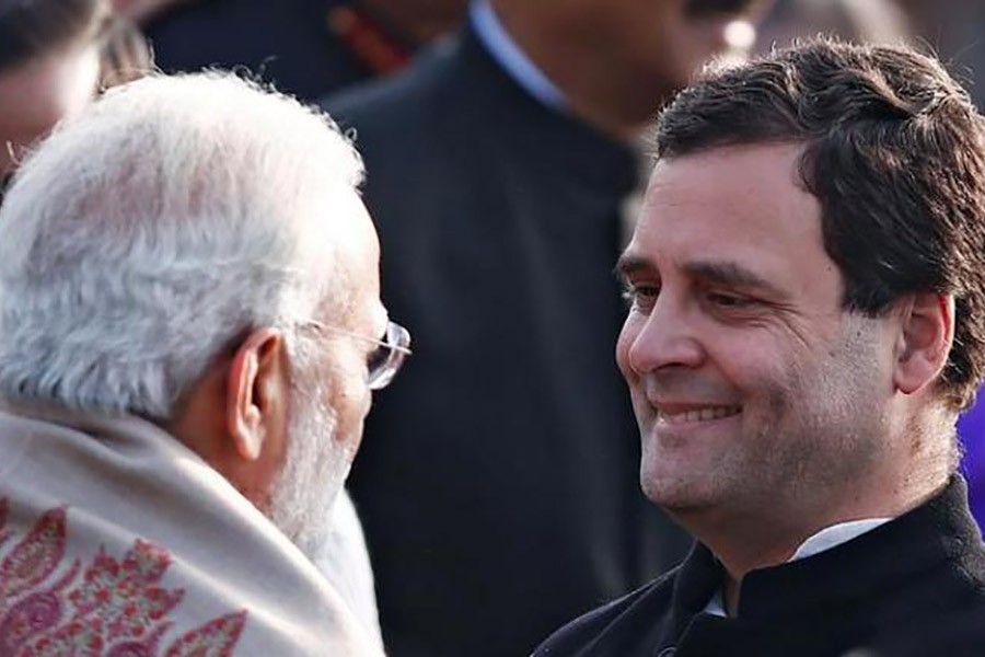 Indian Congress chief Rahul Gandhi mocking and mimicking Indian Prime Minister Narendra Modi while addressing an election rally in Bhopal in February. -Reuters Photo