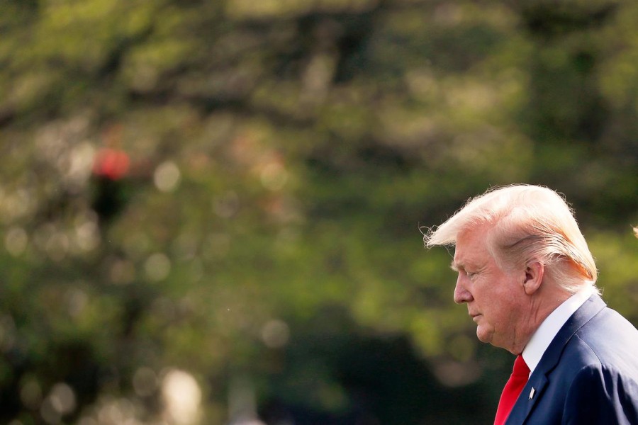 US President Donald Trump prepares to board Marine One en route to his Mar-a-Lago estate in West Palm Beach, Florida following the release of the Mueller report at the White House in Washington, US, April 18, 2019. Reuters