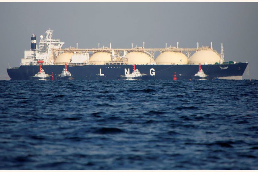 A liquefied natural gas (LNG) tanker is tugged towards a thermal power station in Futtsu, east of Tokyo, Japan recently 	— Reuters