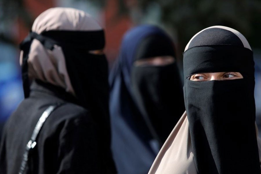 The niqab and burka - worn by Muslim women - were not specifically named - Reuters file photo