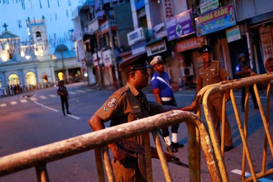 Security personnel stand guard in front of St Anthony's Shrine, days after a string of suicide bomb attacks across the island on Easter Sunday, in Colombo, Sri Lanka, April 29, 2019. Reuters