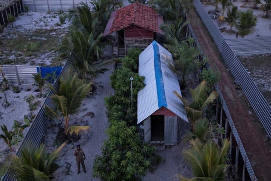 A police officer stands inside a training camp allegedly linked to Islamist militants in Kattankudy, near Batticaloa, Sri Lanka, May 5, 2019. Reuters