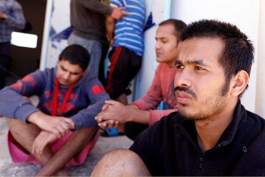 Migrants, who were rescued after their boat capsized in the Mediterranean Sea off the Tunisian Coast after they had left Libya, are seen inside a local Red Cresent chapter in Zarzis, Tunisia on May 11, 2019 — Reuters photo