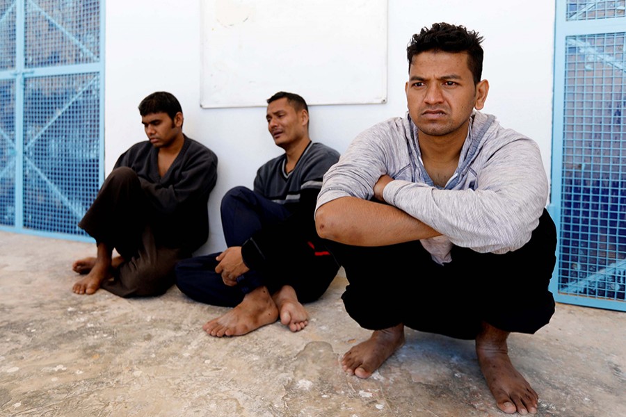 Migrants, who were rescued after their boat capsized in the Mediterranean Sea off the Tunisian Coast after they had left Libya, are seen inside a local Red Cresent chapter in Zarzis, Tunisia on May 11, 2019 — Reuters photo