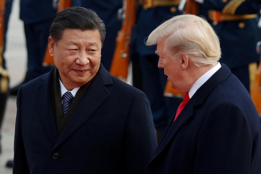 US President Donald Trump takes part in a welcoming ceremony with China's President Xi Jinping at the Great Hall of the People in Beijing, China, November 9, 2017. Reuters/File Photo