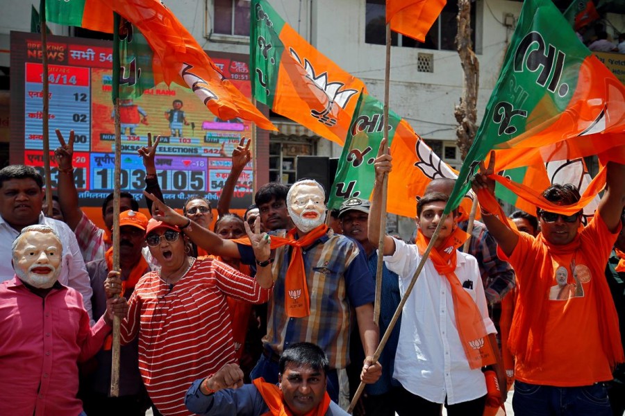 Supporters of Bharatiya Janata Party (BJP) celebrate after learning of initial poll results in Ahmedabad, India, May 23, 2019. Reuters