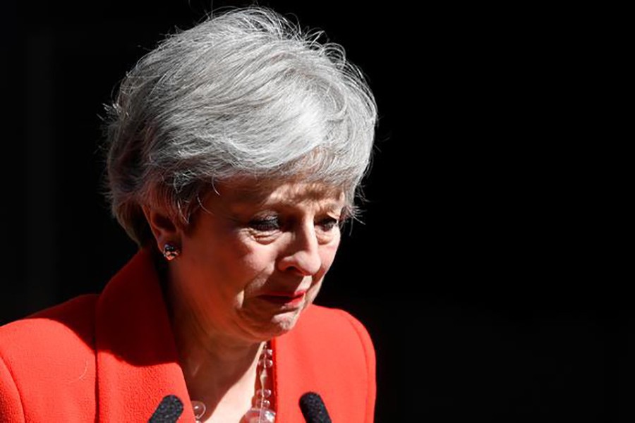 British Prime Minister Theresa May delivering an emotional statement in Downing Street in London on Friday. -Reuters Photo