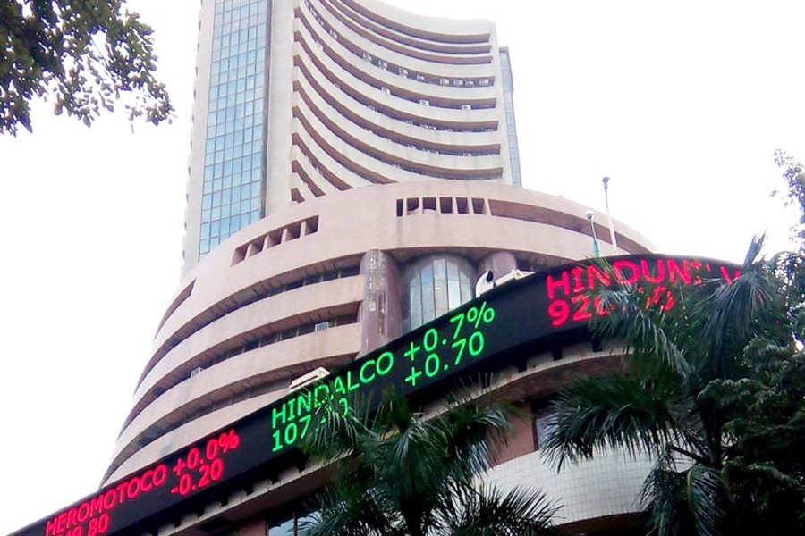 Indian shares end lower after central bank cuts rates