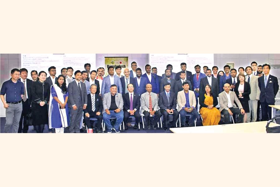 Some participants of Japan IT Week Spring 2019 held in Tokyo pose for a photo