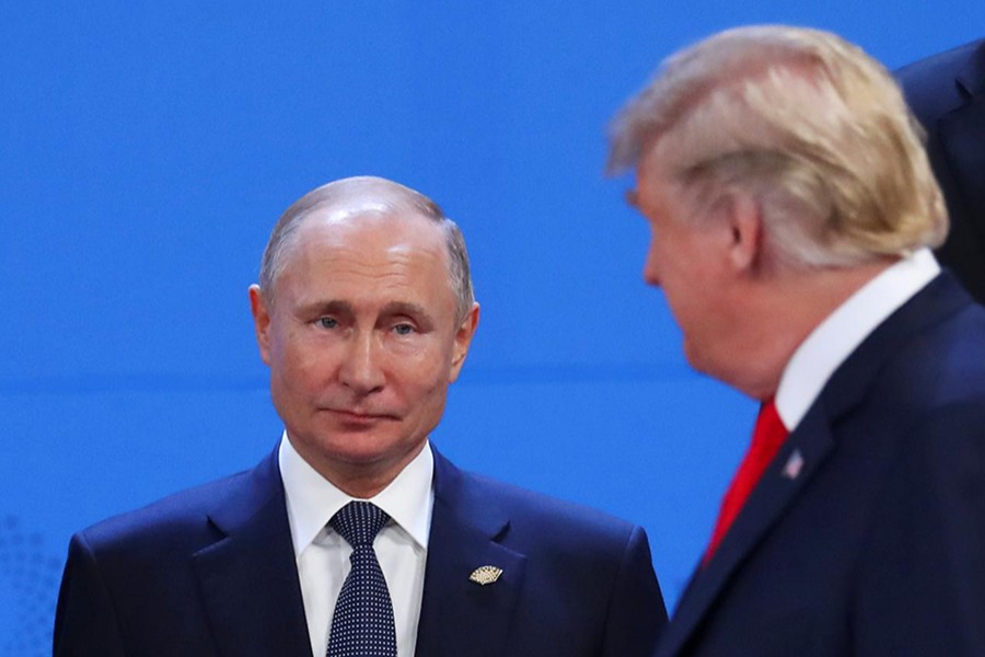 US President Donald Trump (R) and Russia's President Vladimir Putin are seen during the G20 leaders summit in Buenos Aires, Argentina, on November 30, 2018 — Reuters/Files