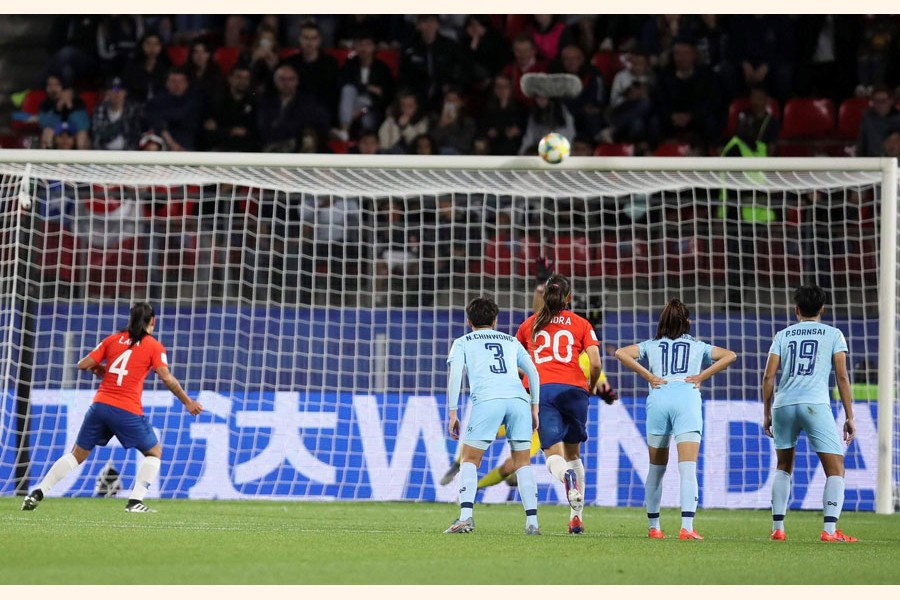 Chile's Francisca Lara (left) hitting the crossbar from the penalty spot during the Women's World Cup Group F match against Thailand at the Roazhon Park in Rennes, France on Thursday	— AP