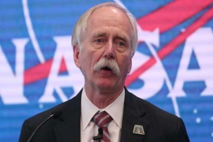 Bill Gerstenmaier, Associate Administrator, NASA's Human Exploration and Operations Mission Directorate, NASA Headquarters, speaks during a press conference announcing that NASA is opening the International Space Station for commercial business so US industry innovation and ingenuity can accelerate a commercial economy in low-Earth orbit at the NASDAQ Market site, at Times Square in New York City, US, June 7, 2019. Reuters/File Photo