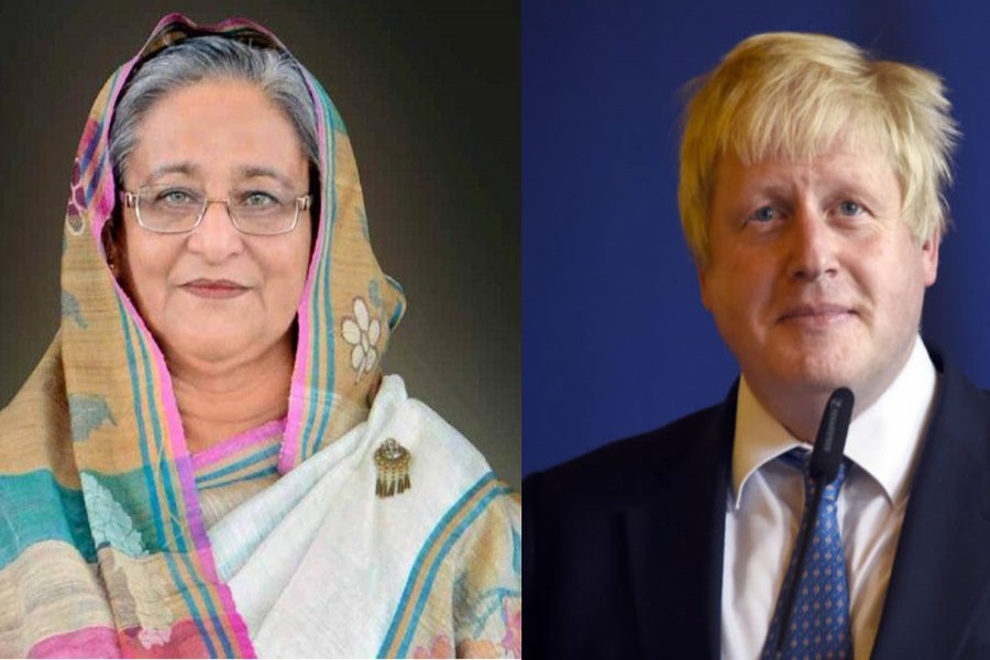 Hasina wishes Johnson with mangoes, flowers