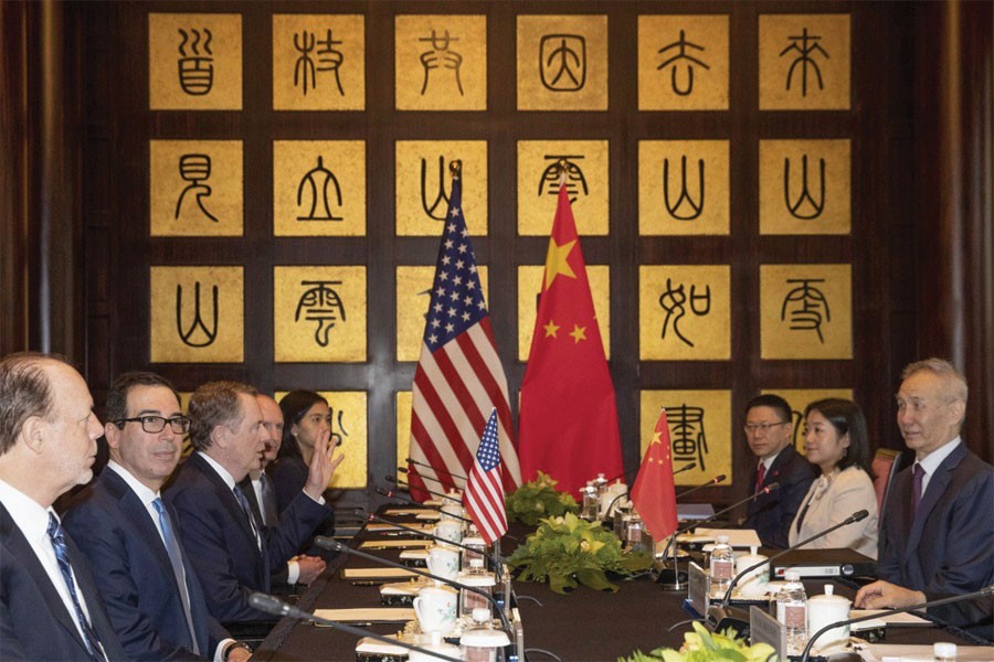 CHINA-US TRADE TALKS RESUME IN SHANGHAI IN SHADOW OF DONALD TRUMP'S ANGRY TWEETS AIMED AT BEIJING: Chinese Vice-Premier Liu He (right) with US Trade Representative Robert Lighthizer (third left) and US Treasury Secretary Steve Mnuchin (second left) in Shanghai on July 31, 2019.             —Photo: AP      