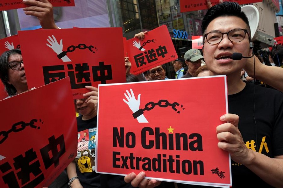 Demonstrators march during a protest to demand authorities scrap a proposed extradition bill with China, in Hong Kong, China April 28, 2019 - REUTERS