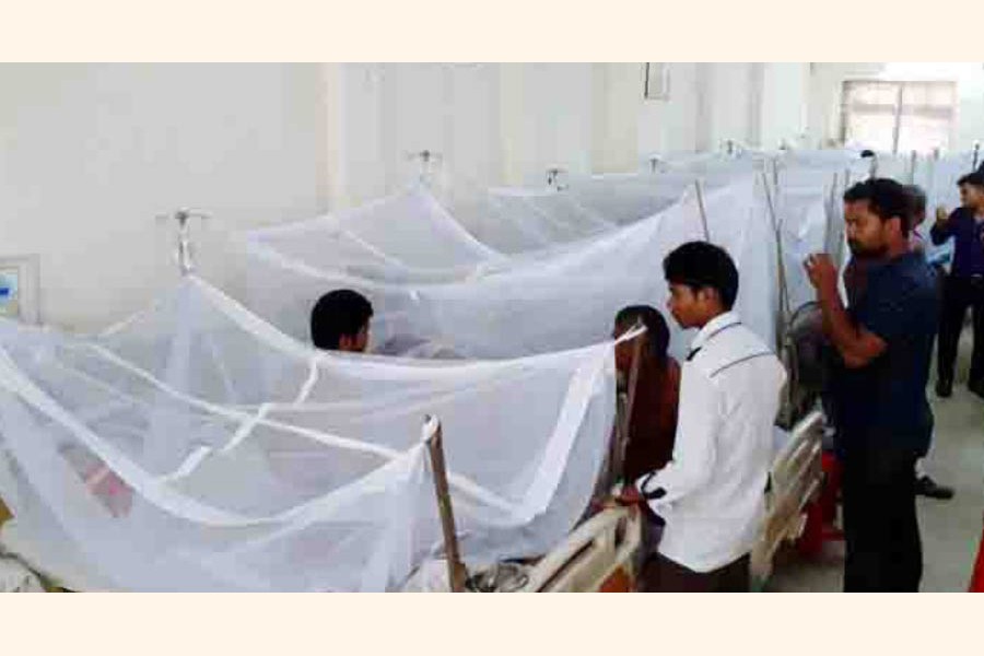 Dengue-affected patients undergoing treatment at the Rangpur Medical College and Hospital. The photo was taken on Monday     	— FE Photo