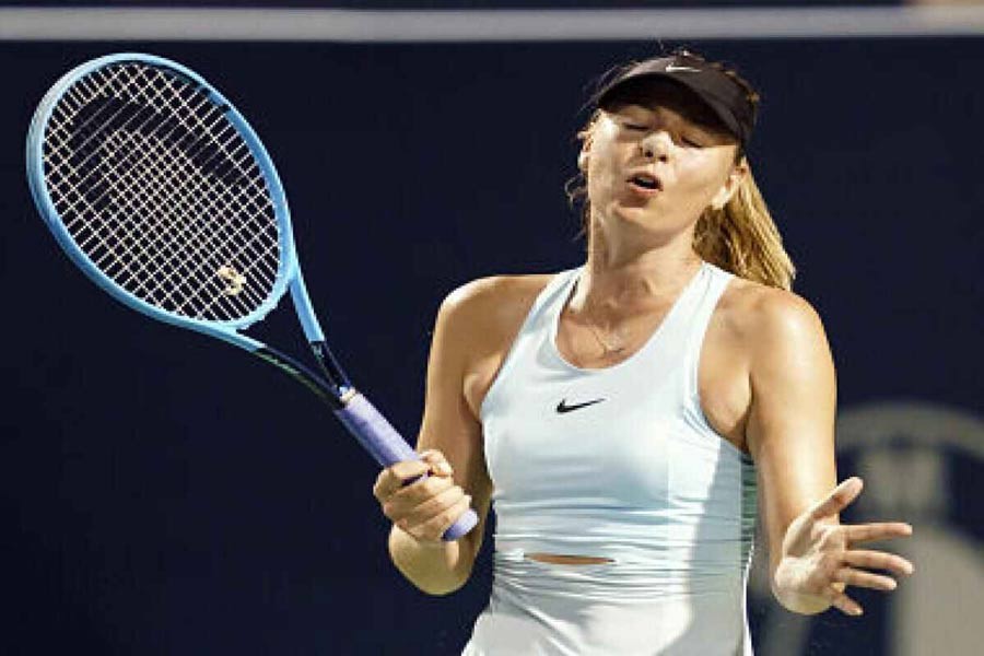 Russia's Maria Sharapova reacting during play against Estonia's Anett Kontaveit during a first round match on Day 3 of the Rogers Cup at Aviva Centre on Monday	— AP