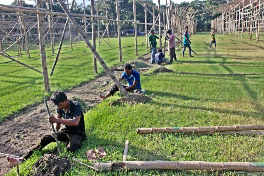 Workers busy preparing the National Eidgah ground for the main congregation of Eid-ul-Azha, to be celebrated on August 12 — Focus Bangla photo