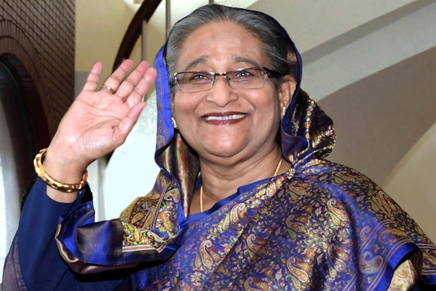 Prime Minister Sheikh Hasina seen waving her hand at Dhaka's Hazrat Shahjalal International Airport in this undated Focus Bangla photo