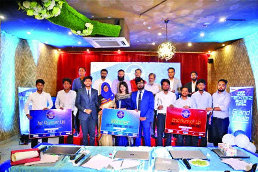 Winning team members with dignitaries present at the grand finale of TEXBIZ 2019 organised by Bangladesh University of Textiles (BUTEX) Business Club