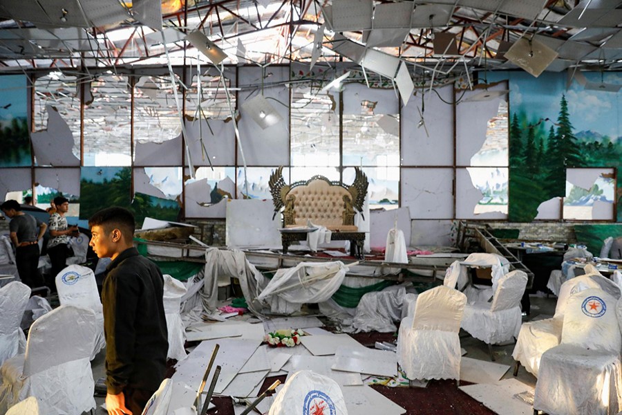 Workers of a wedding hall inspect after a blast in Kabul, Afghanistan on August 18, 2019 — Reuters photo