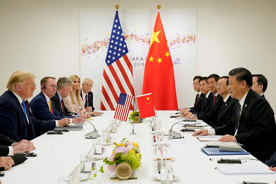 US President Donald Trump meets with China's President Xi Jinping at the start of their bilateral meeting at the G20 leaders summit in Osaka, Japan on June 29, 2019 — Reuters/Files