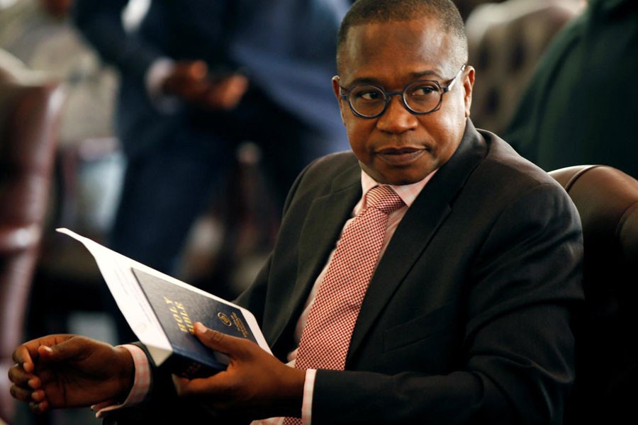 Zimbabwean Finance Minister Mthuli Ncube looks on before the swearing in of new cabinet ministers at State House in Harare, Zimbabwe, September 10, 2018. REUTERS/Philimon Bulawayo