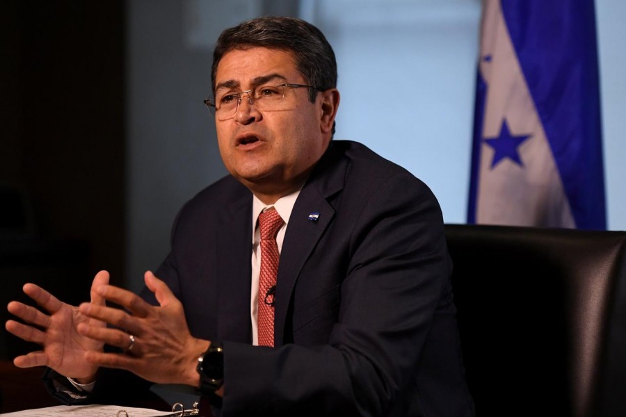 Honduran President Juan Orlando Hernandez speaks during an interview with Reuters on the sidelines of the United Nations General Assembly in New York City, US September 24, 2018. REUTERS/Darren Ornitz