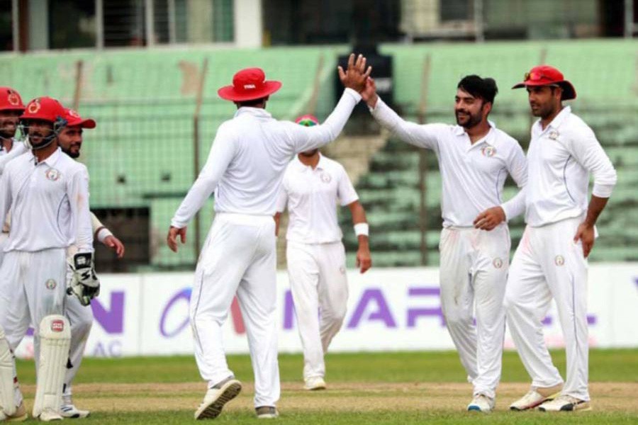 Afghanistan's captain Rashid Khan celebrating after taking a wicket against BCB XI during a practice match in the 2nd and final day at MA Aziz Stadium in Chattogram on Monday	— bdnews24.com