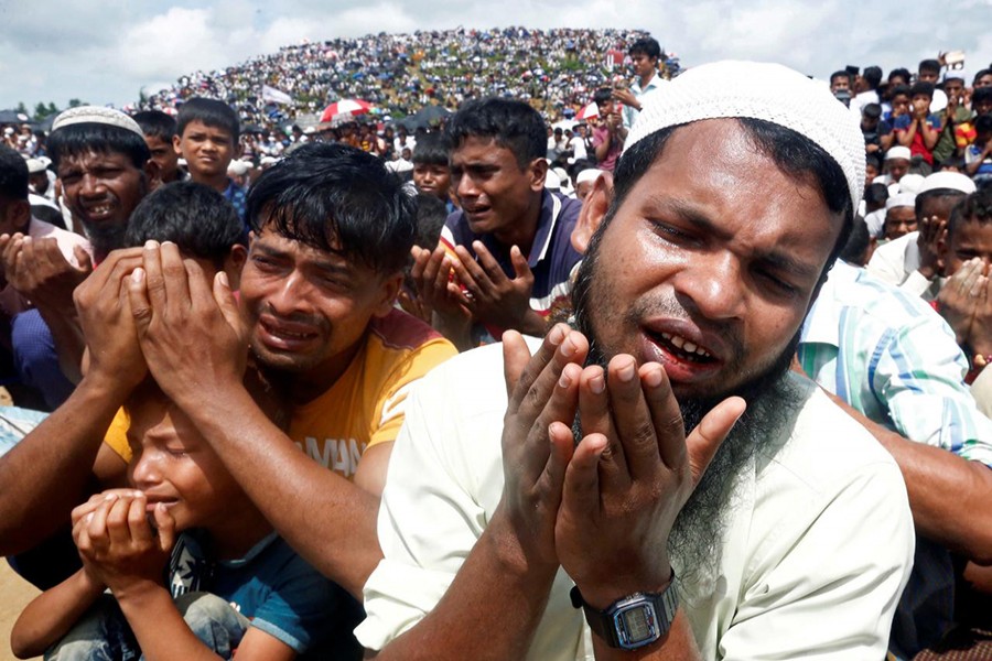 Rohingya refugees take part in a prayer as they gather to mark the second anniversary of the exodus at the Kutupalong camp in Cox’s Bazar, Bangladesh on August 25, 2019 — Reuters/Files