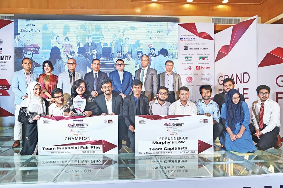 (From left to right) Muhammad Nasiruddin-- faculty advisor, NSU Finance Club, Parisa Shakur-- director, Student Affairs, NSU, Professor Md Ismail Hossain-- Pro VC, NSU, Anisul Huq-- minister of Law, Justice and Parliamentary Affairs, Waqar Ahmed Chowdhury--MD and CEO, Vanguard AML, Mohammad Mahbubur Rahman-- DMD and CFO, City Bank, Dr Jashim Uddin-- acting dean, School of Business and Economics, NSU with the winning teams