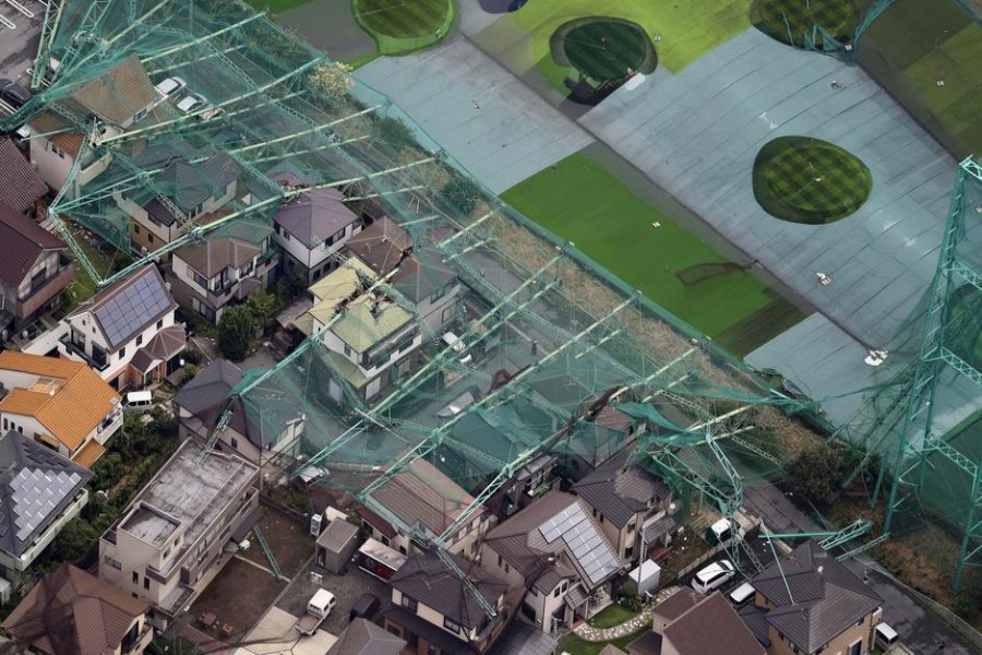 Houses damaged by a collapse of the perimeter netting of a golf training field due to strong winds of Typhoon Faxai are seen in Ichihara, east of Tokyo, Japan September 9,, 2019, in this photo taken by Kyodo. Mandatory credit Kyodo/via REUTERS