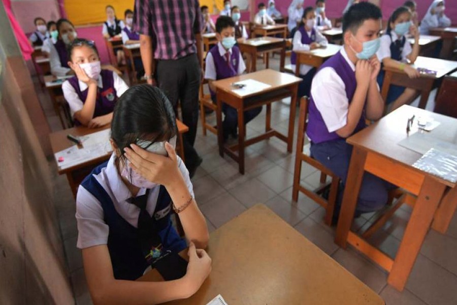 Haze hits Malaysian state, shuts schools