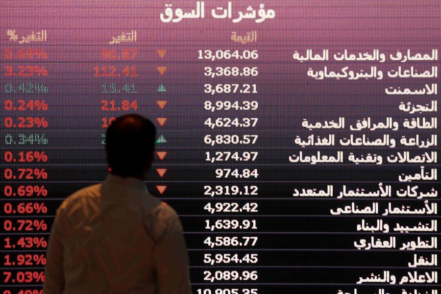 An investor monitors a screen displaying stock information at the Saudi Stock Exchange (Tadawul) in Riyadh, Saudi Arabia January 18, 2016 — Reuters/Files