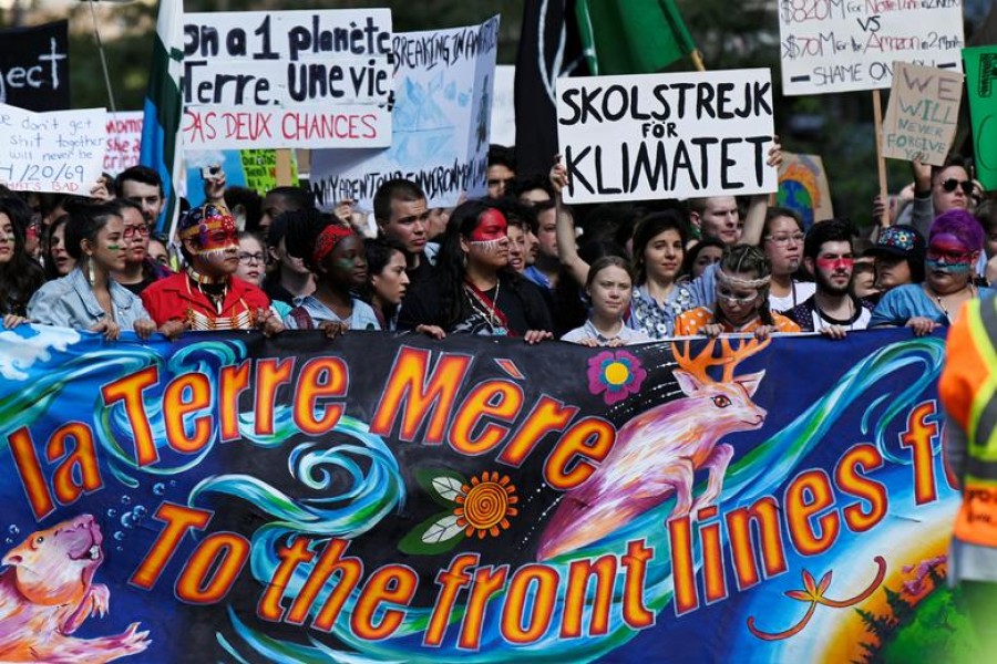 Climate change environmental teen activist Greta Thunberg takes part in a climate strike march in Montreal, Quebec, Canada September 27, 2019. REUTERS/Andrej Ivanov