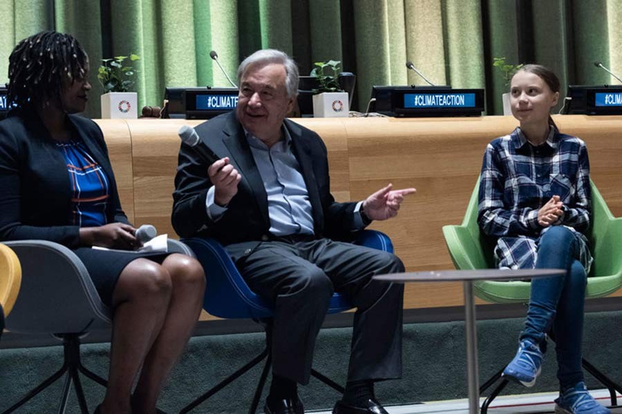 UN Secretary-General António Guterres (centre) and Greta Thunberg (right), Youth Climate Activist, at the opening of the UN Youth Climate Summit on September 21, 2019.  — Courtesy: UN Photo/Kim Haughton