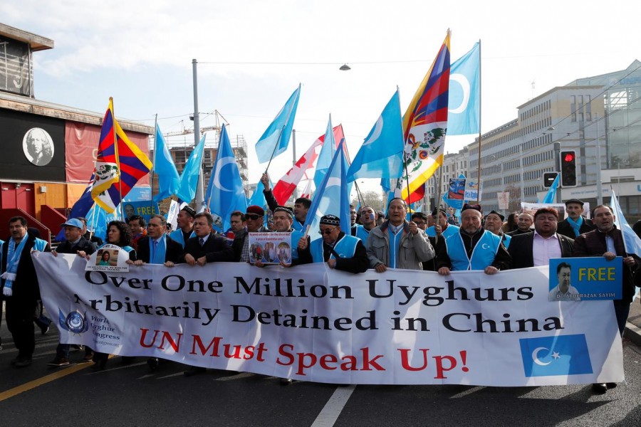 People demonstrate against China during its Universal Periodic Review by the Human Rights Council in front of the United Nations Office in Geneva, Switzerland, November 6, 2018. REUTERS/Denis Balibouse