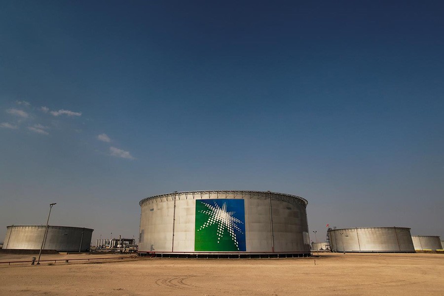 A view shows branded oil tanks at Saudi Aramco oil facility in Abqaiq, Saudi Arabia last month. -Reuters file photo