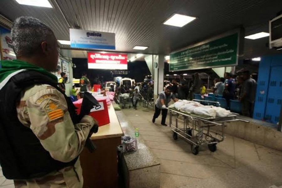 Rescue workers push stretcher trolleys carrying the bodies of dead village defence volunteers, who were killed by suspected separatist insurgents, at a hospital in Yala province, southern Thailand, November 6, 2019. REUTERS/Surapan Boonthanom