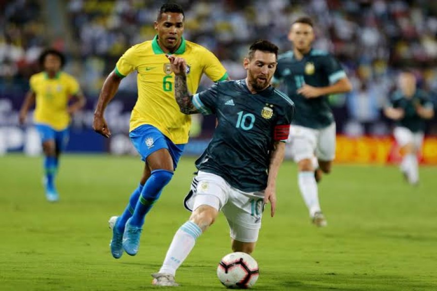 International Friendly - Brazil v Argentina - King Saud University Stadium, Riyadh, Saudi Arabia - November 15, 2019 Argentina's Lionel Messi in action with Brazil's Alex Sandro REUTERS/Ahmed Yosri