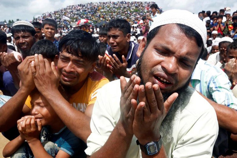 Rohingya refugees pray at a gathering marking the second anniversary of their exodus from Myanmar, at the Kutupalong camp in Cox’s Bazar, Bangladesh, August 25, 2019. Reuters/File Photo