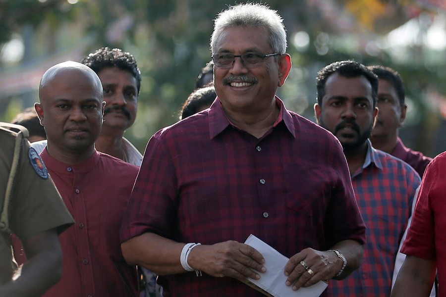 Sri Lanka People's Front party presidential election candidate and former wartime defence chief Gotabaya Rajapaksa leaves after casting his vote during the presidential election in Colombo, Sri Lanka on Saturday — Reuters photo