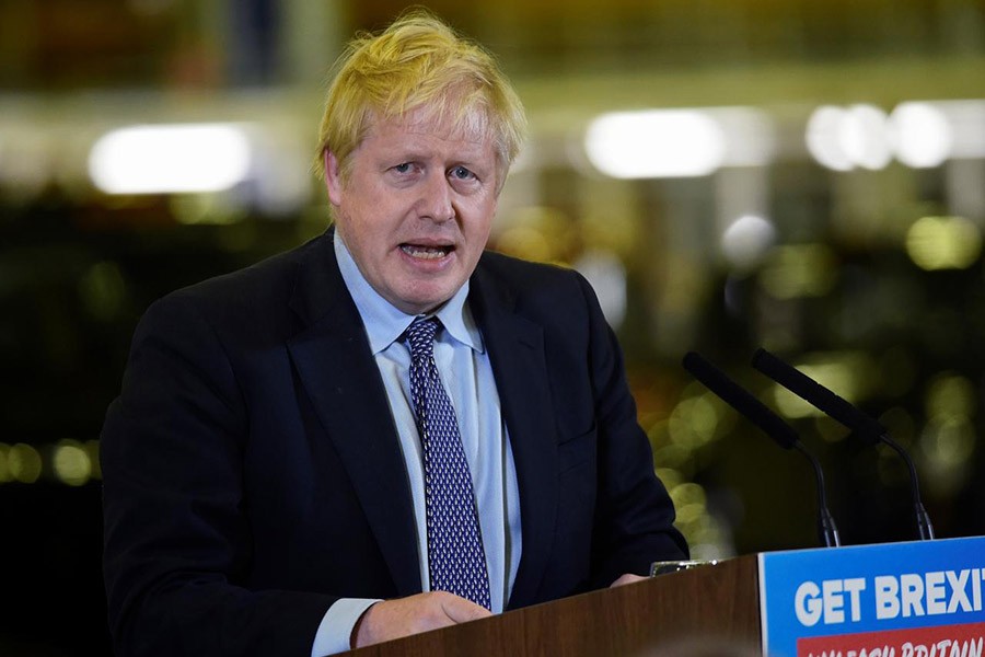 Britain's Prime Minister Boris Johnson speaking as he visits an electric car plant in Warwickshire, Britain November 13, 2019. -Reuters Photo