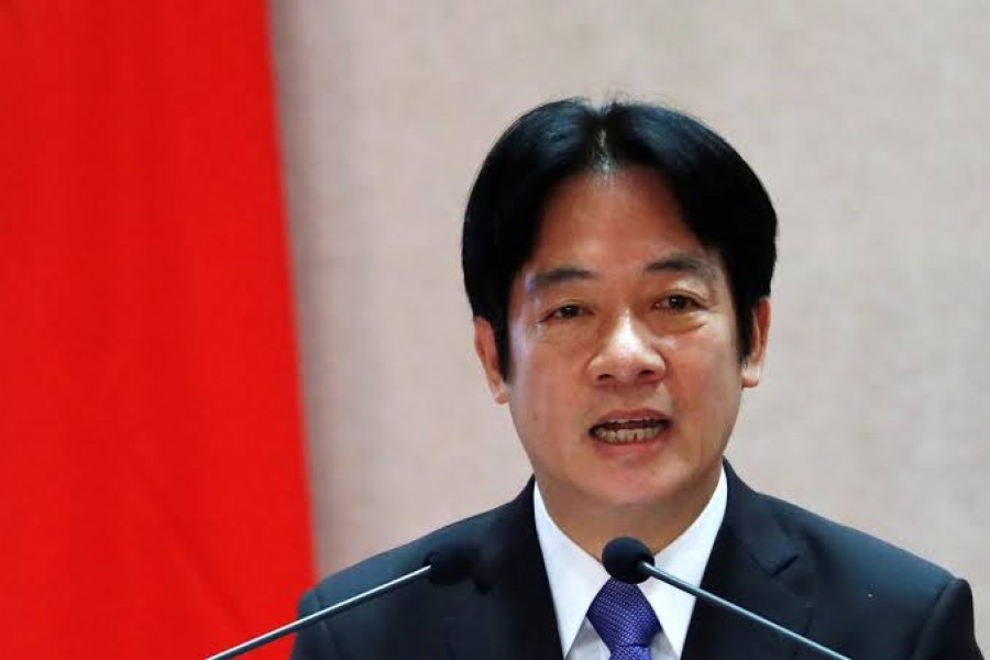 FILE PHOTO: Taiwanese new premier William Lai speaks during a cabinet transition ceremony in Taipei, Taiwan September 8, 2017. REUTERS/Tyrone Siu/File Photo