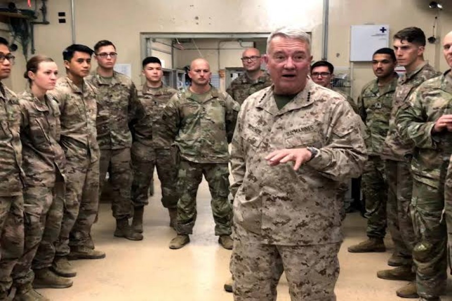 FILE PHOTO: Marine General Kenneth McKenzie, head of U.S. Central Command, speaks with U.S. troops while visiting Forward Operating Base Fenty in Jalalabad, Afghanistan, September 9, 2019. REUTERS/Phil Stewart/File Photo